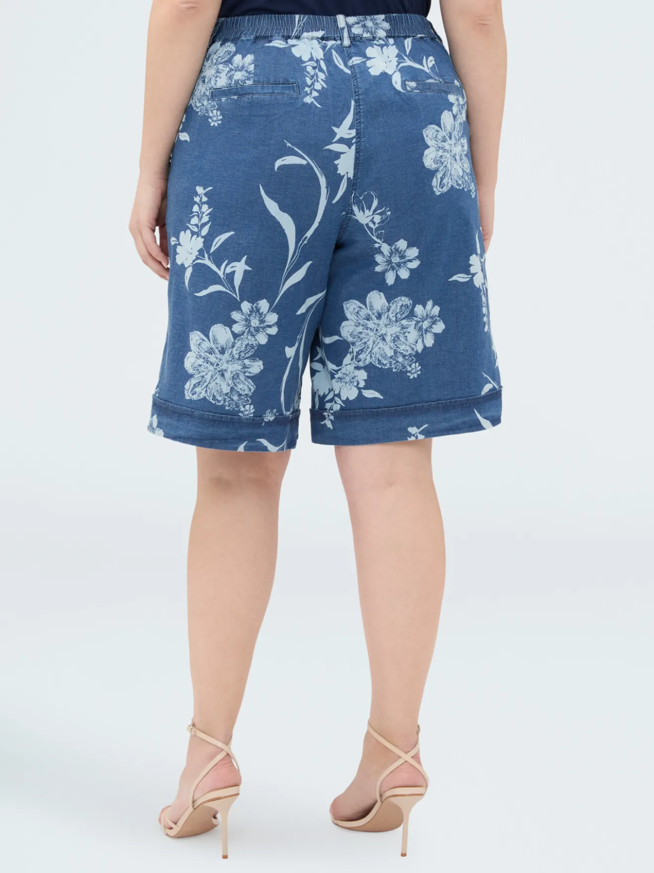 Bermuda in denim con stampa foliage delavé