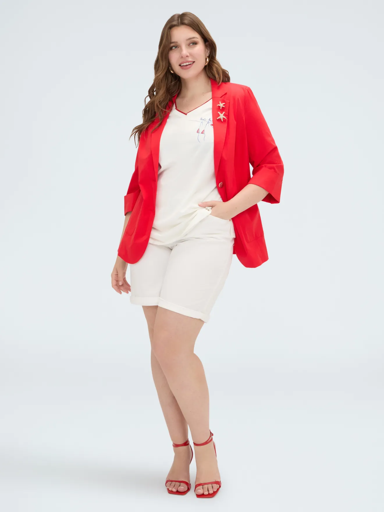 Blazer con spille