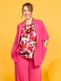Blazer fluido con bottone gioiello