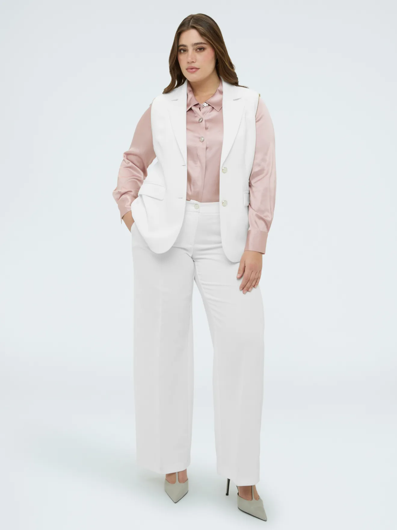 Blazer 2 in 1 con maniche staccabili
