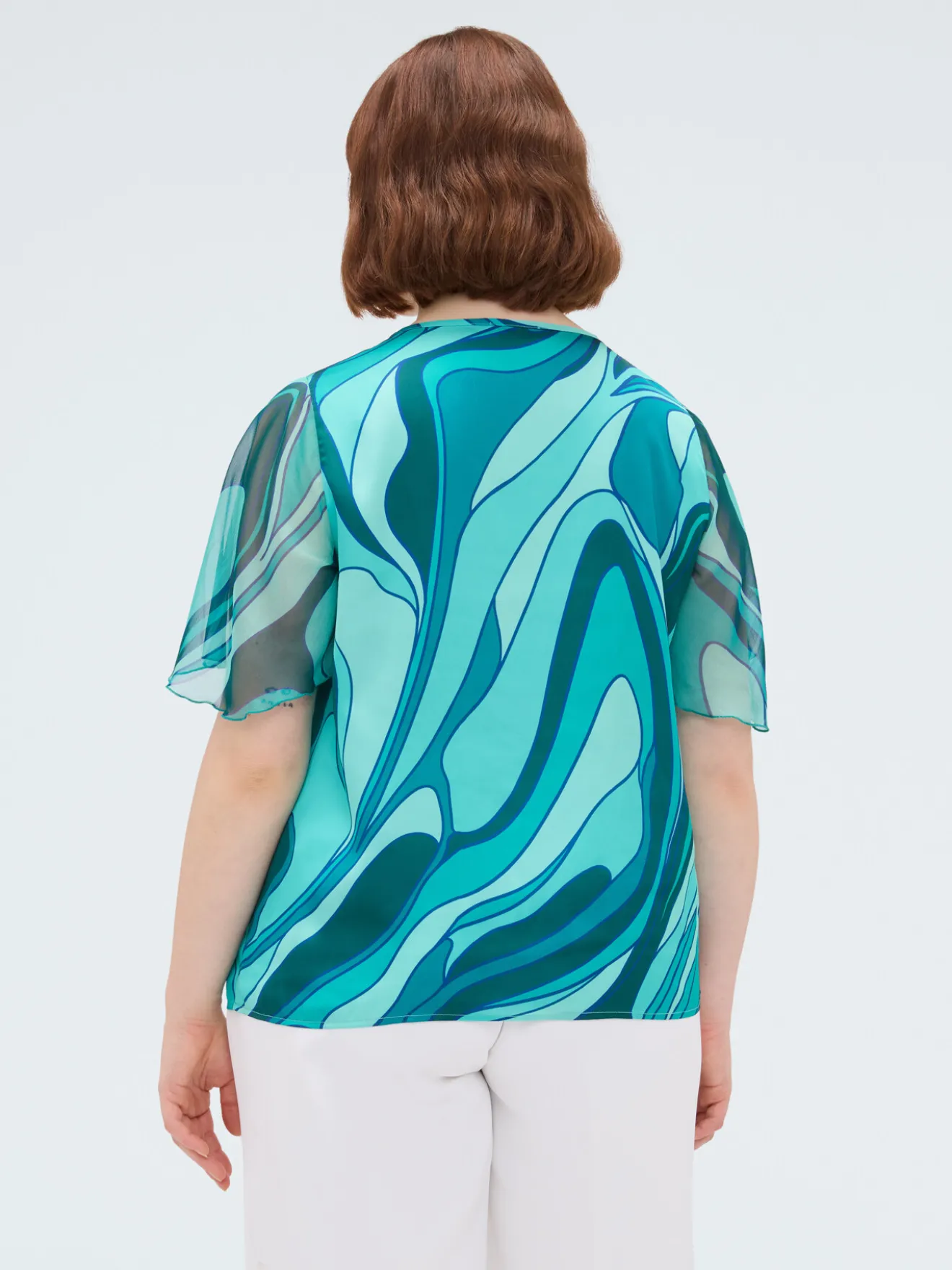 Blusa bimaterica con stampa