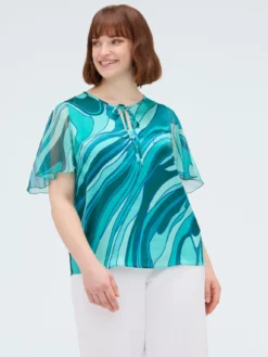 Blusa bimaterica con stampa