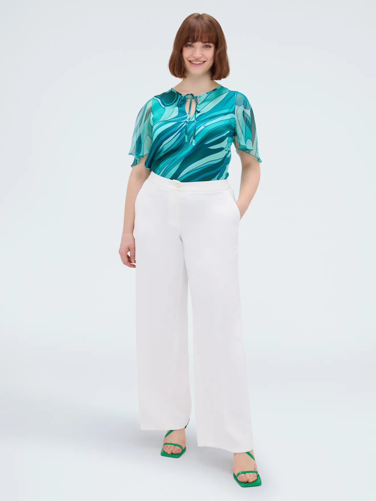 Blusa bimaterica con stampa