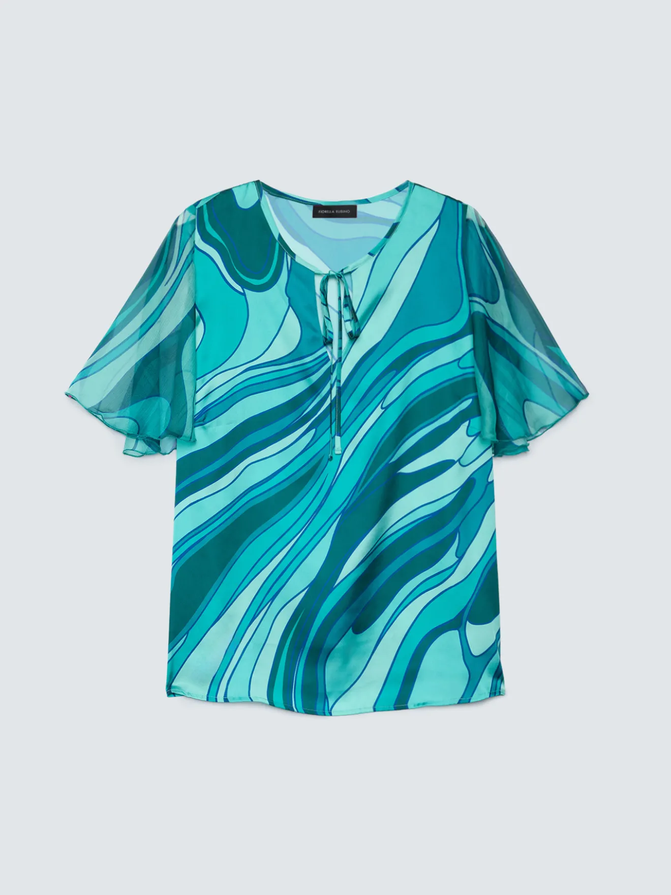 Blusa bimaterica con stampa