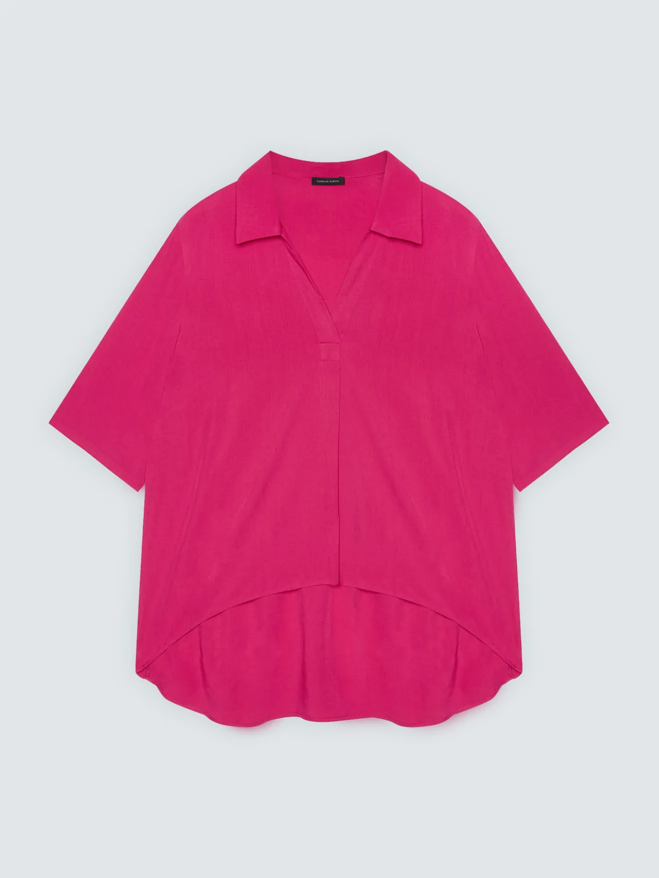 Blusa boxy con collo polo