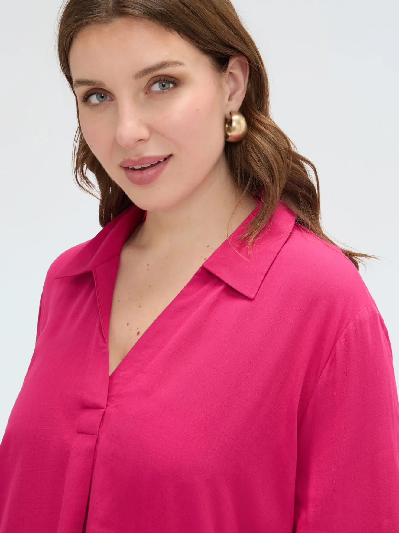 Blusa boxy con collo polo