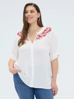 Blusa con ricami floreali