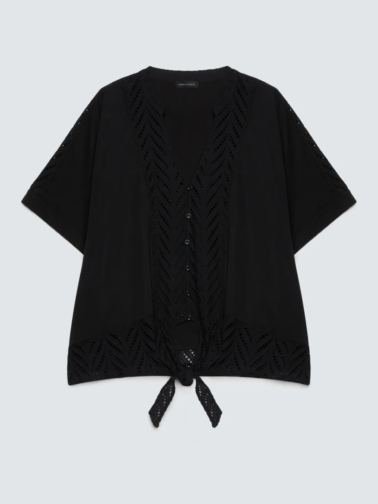 Blusa in sangallo con nodo