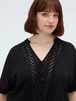 Blusa in sangallo con nodo