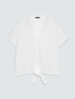 Blusa in sangallo con nodo