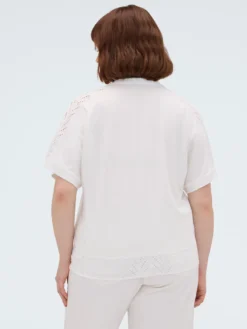 Blusa in sangallo con nodo