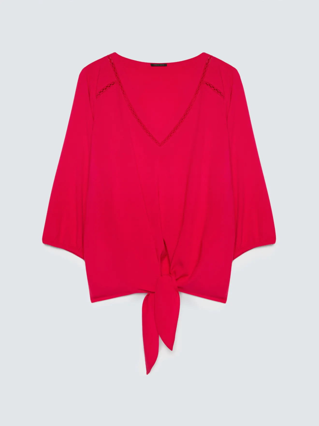 Blusa in viscosa con nodo al fondo