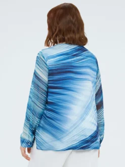 Blusa in viscosa stampata con volant