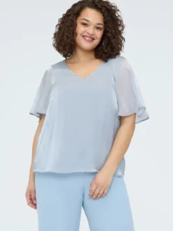 Blusa texture metallizzata con punti luce