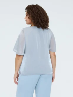 Blusa texture metallizzata con punti luce