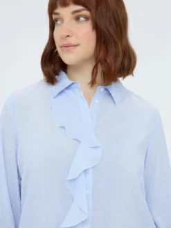 Camicia con volant e fiore
