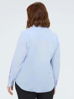 Camicia con volant e fiore