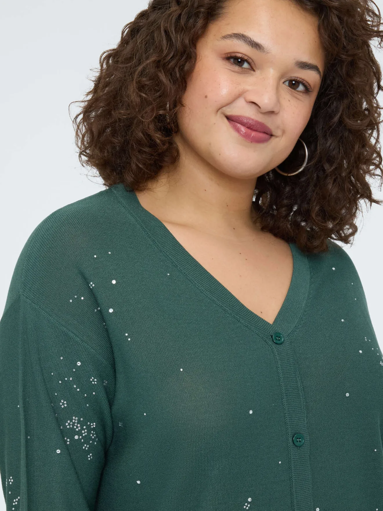 Cardigan con applicazioni luminose