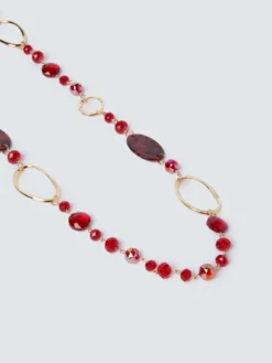 Collana lunga con perline e anelli