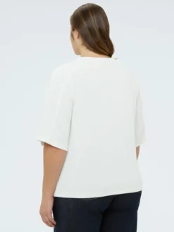 Felpa con applicazioni sullo scollo