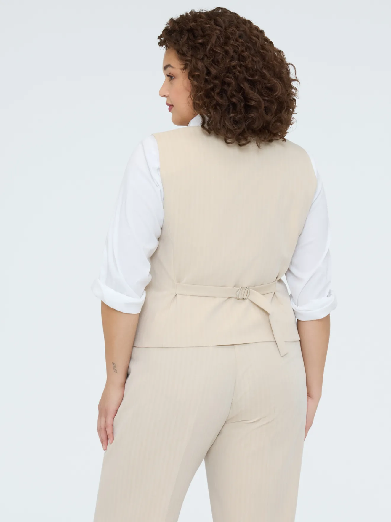 Gilet con bottoni gioiello