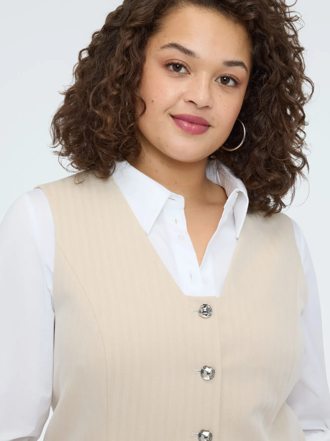 Gilet con bottoni gioiello