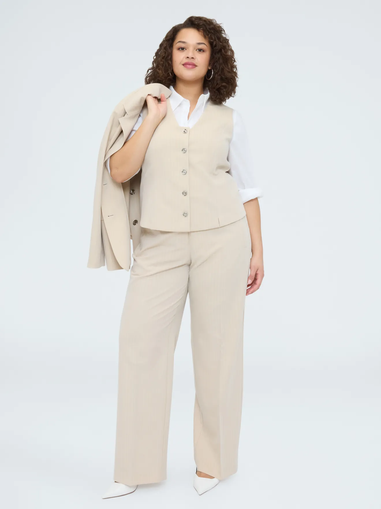 Gilet con bottoni gioiello