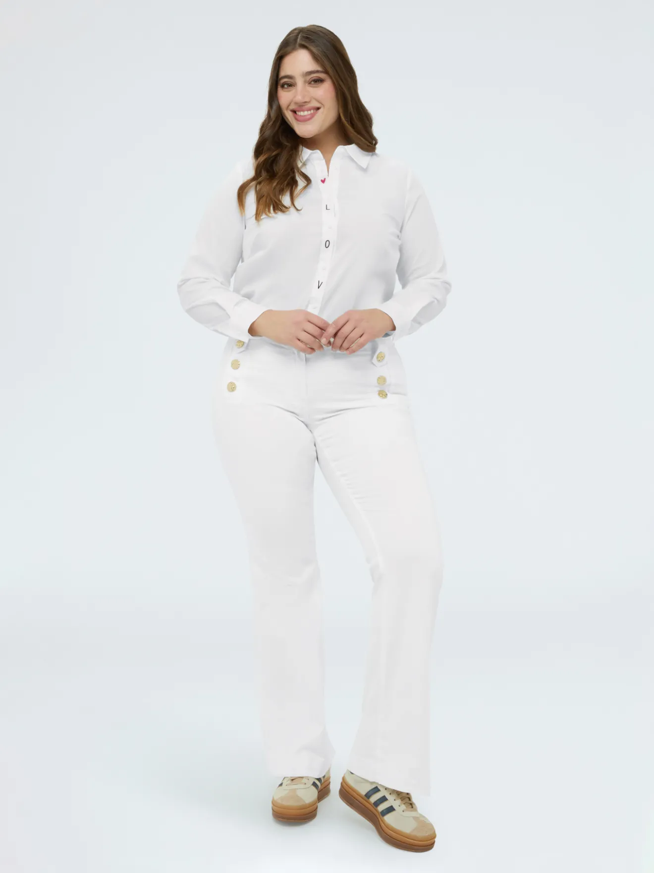 Jeans Flare con bottoni decorativi