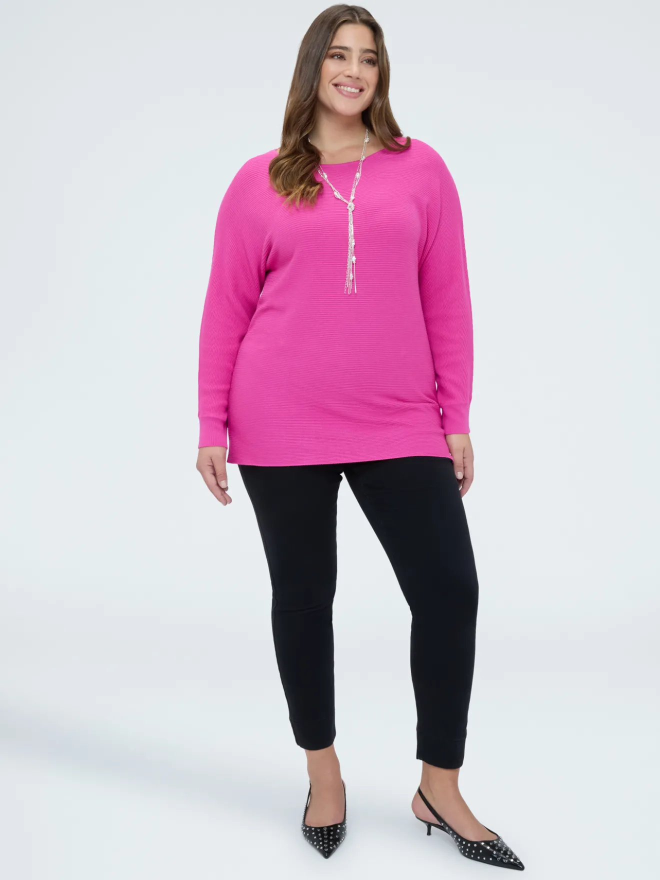 Jeggings in denim black con bottoni decorativi
