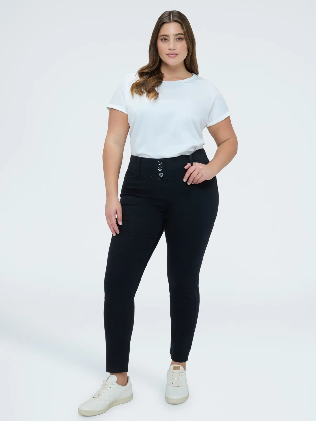 Jeggings in denim black con bottoni decorativi