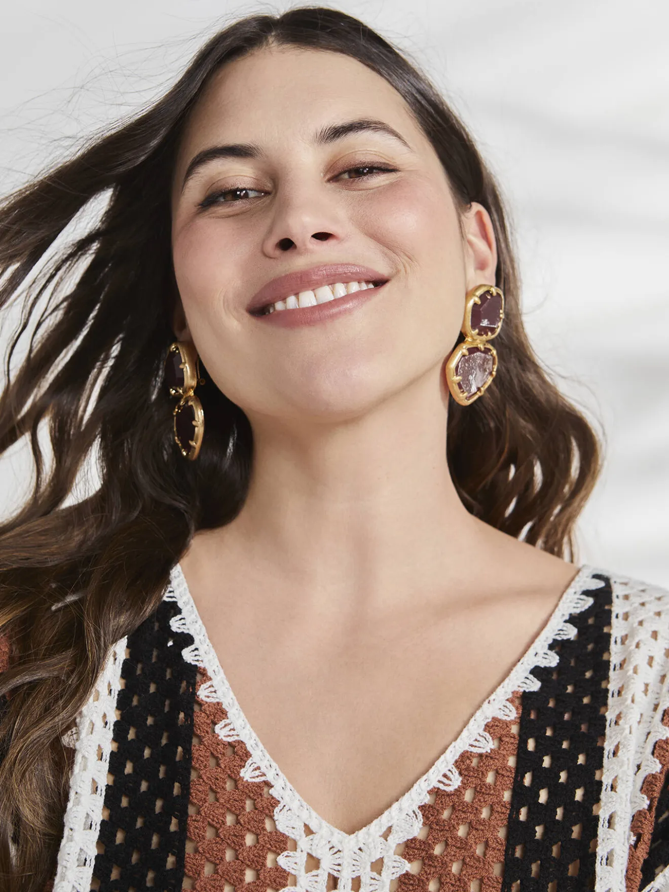 Maglia traforata a righe