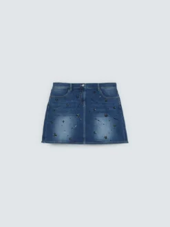 Minigonna in denim con applicazioni