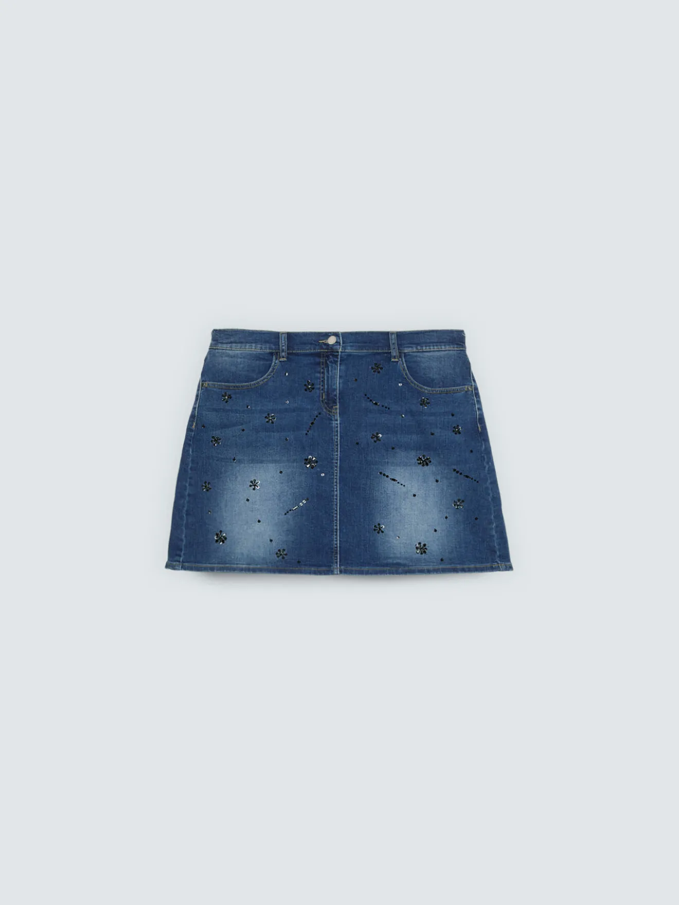 Minigonna in denim con applicazioni