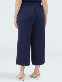 Pantaloni cropped con orlo ricamato