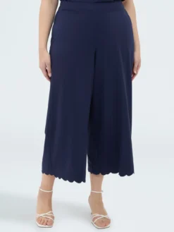 Pantaloni cropped con orlo ricamato