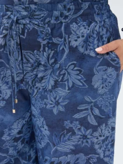 Pantaloni cropped in chambray con stampa