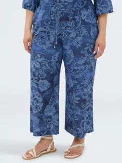 Pantaloni cropped in chambray con stampa