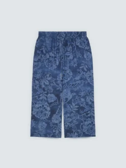Pantaloni cropped in chambray con stampa