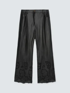 Pantaloni cropped in tessuto spalmato con motivi floreali