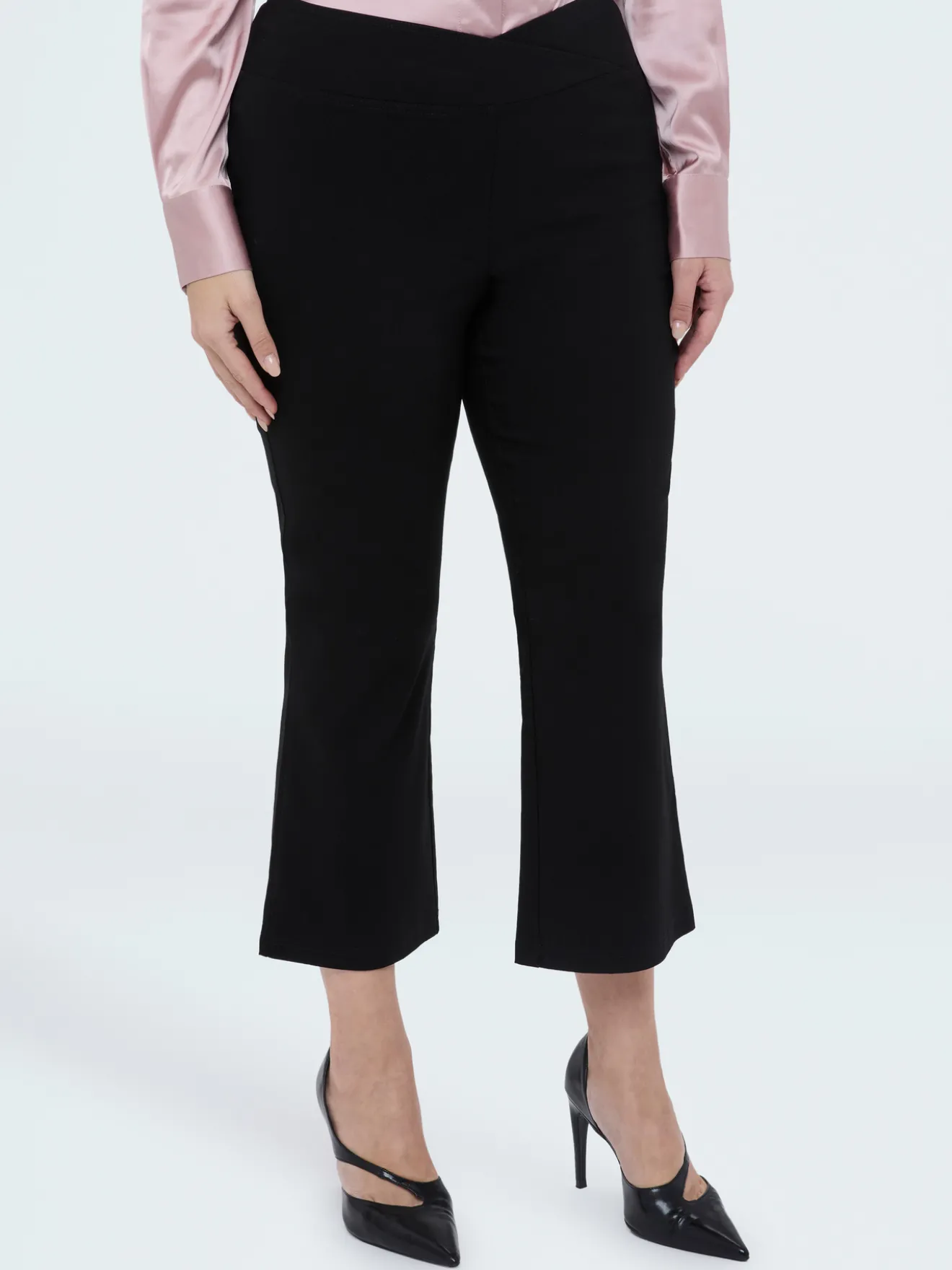 Pantaloni Kick Flare vita elasticizzata asimmetrica