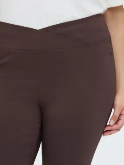 Pantaloni Kick Flare vita elasticizzata asimmetrica