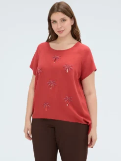 Top con applicazioni paillettes e nodo