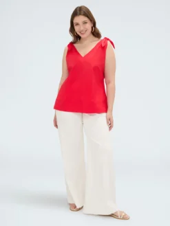 Top in cotone con nodi a fiocco sulle spalle