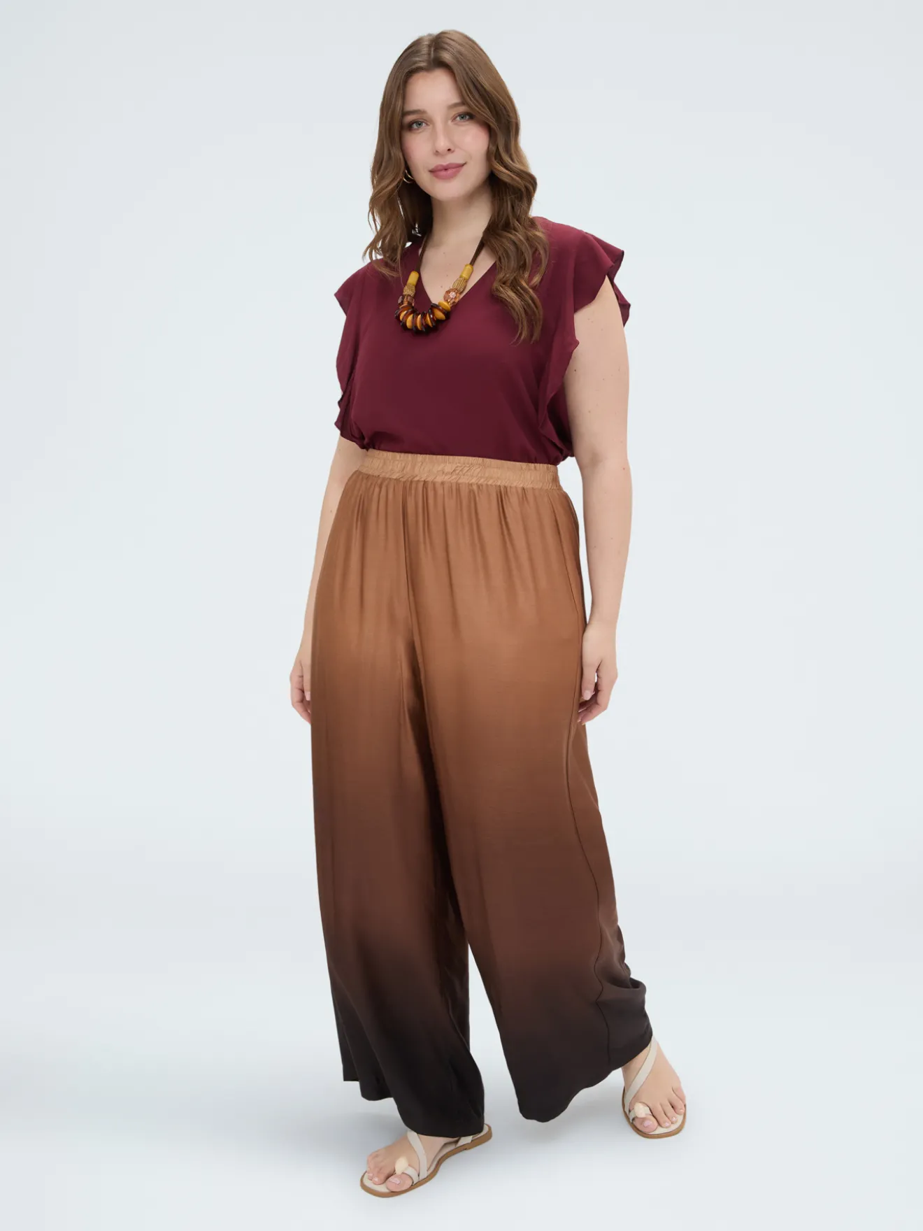Top in mussola con volant sulle spalle