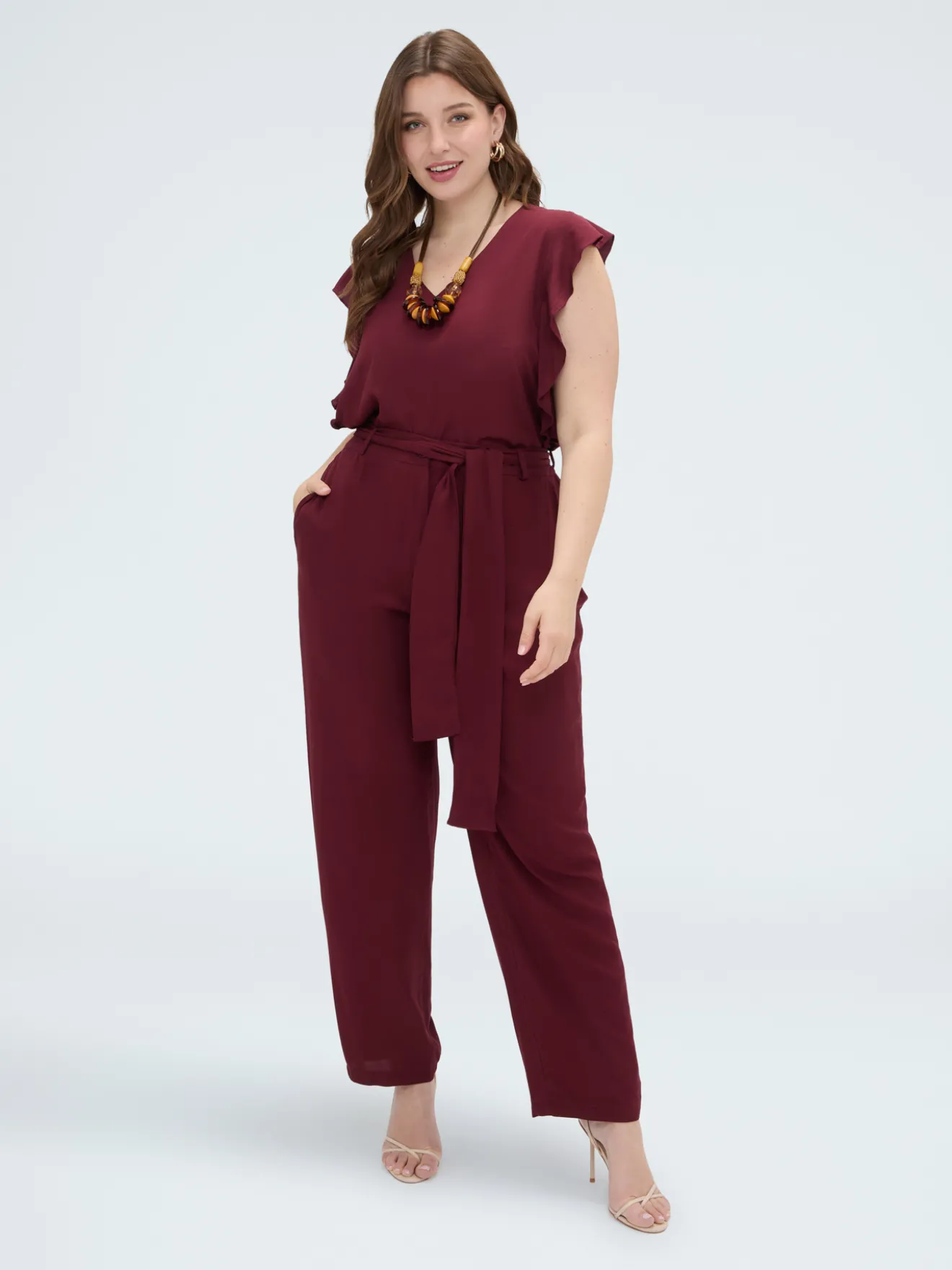 Top in mussola con volant sulle spalle