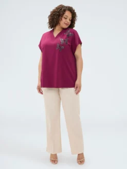 T-shirt bimaterica con farfalle in paillettes
