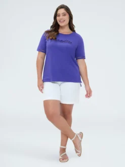 T-shirt in cotone con scritta in paillettes