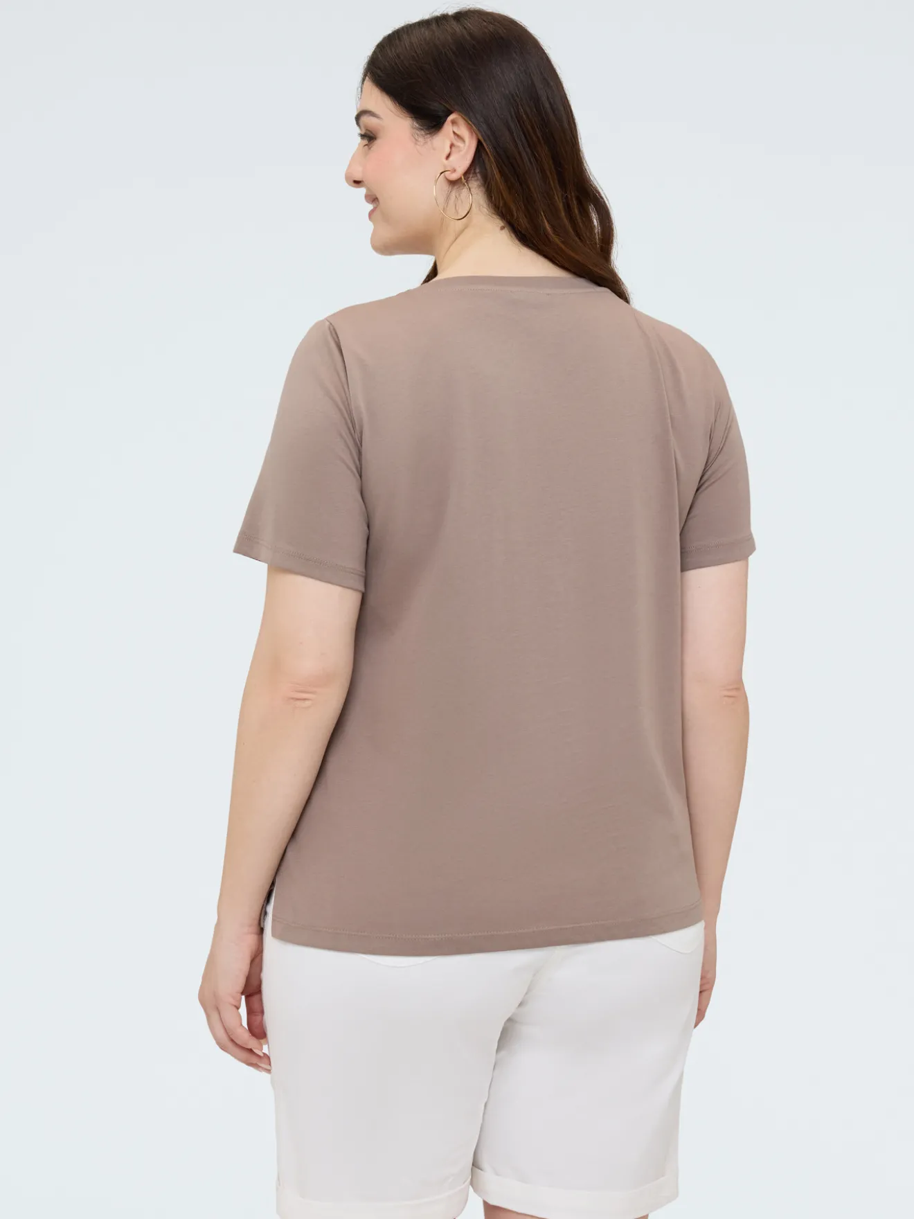 T-shirt in cotone con taschino in uncinetto e paillettes
